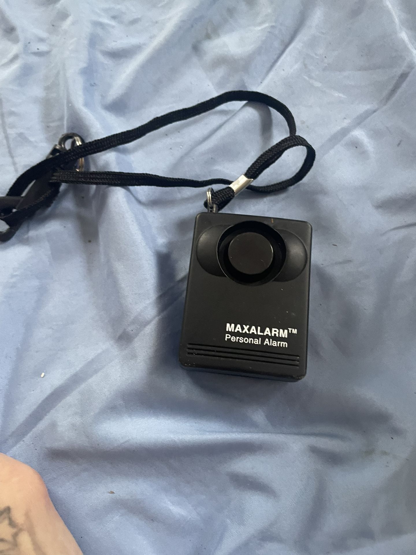 Maxalarmâ„¢ Personal Alarm, which is a personal safety device designed to deter potential threats and attract attention in emergency situations