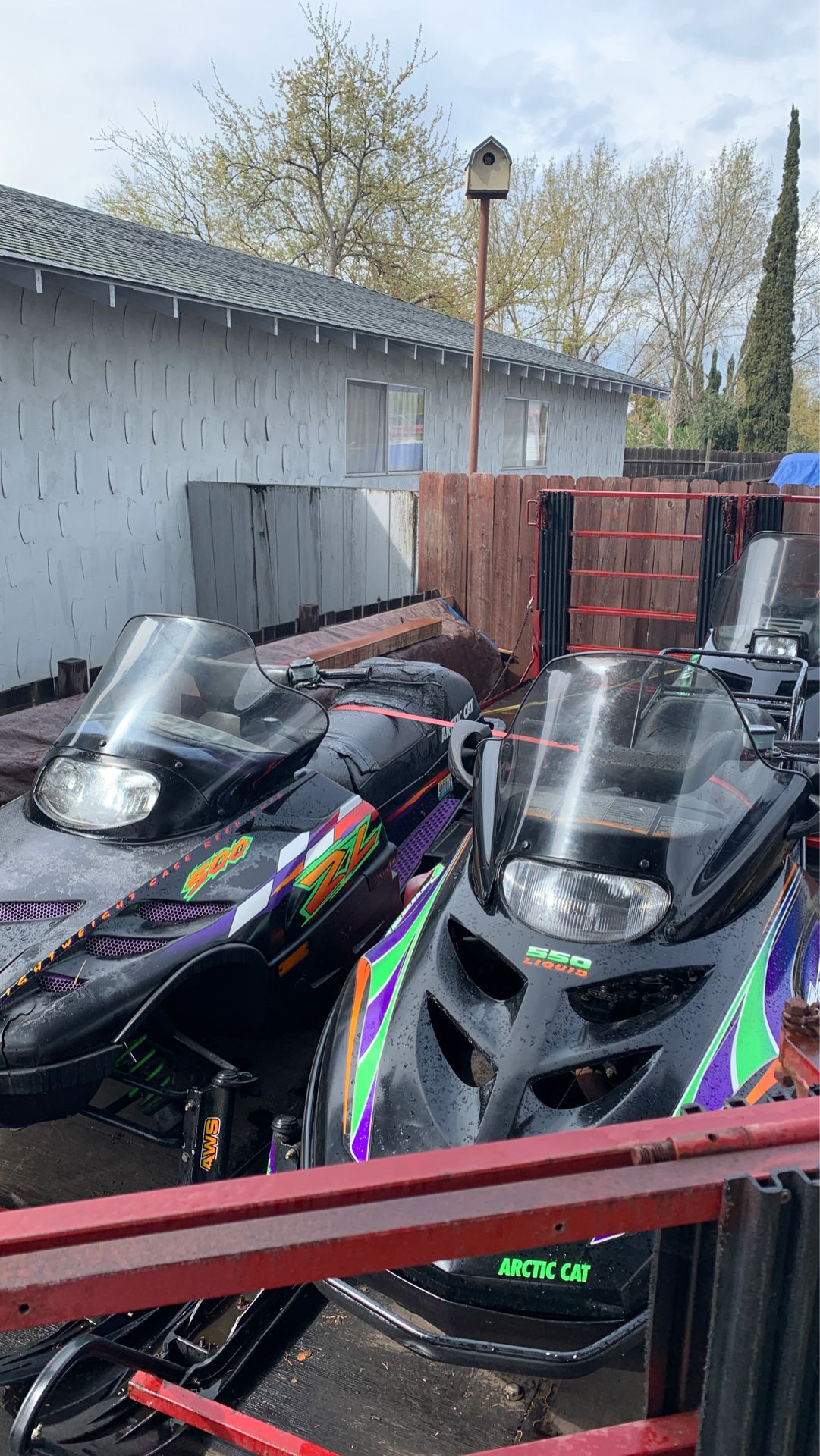 Snowmobiles and trailer