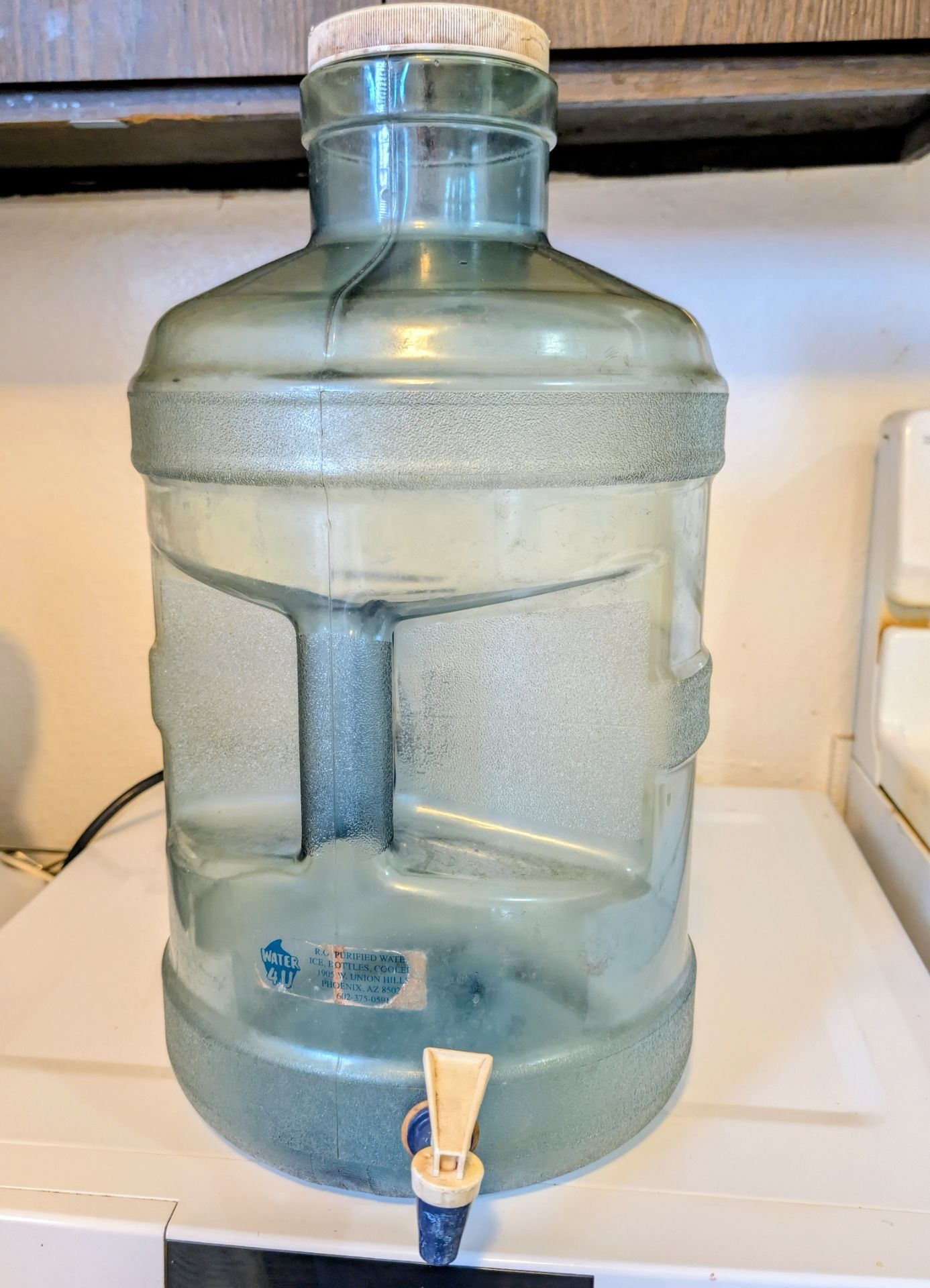 4 plastic water jugs