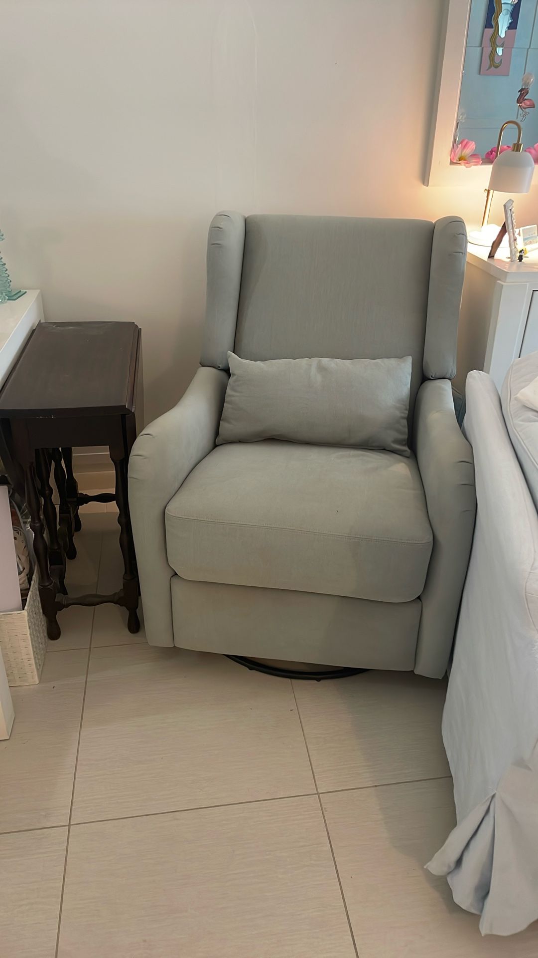 City Furniture Rocker Swivel Recliner. Pale Green