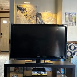 LG TV 42” and Entertainment Stand