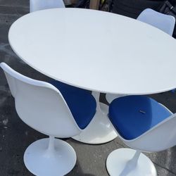 White Timberland table with four chairs