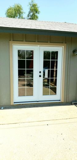 NEW FRENCH DOORS WITH SQUARES DESIGN INSIDE THE GLASS