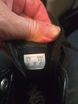 Boys black Vans skate shoes