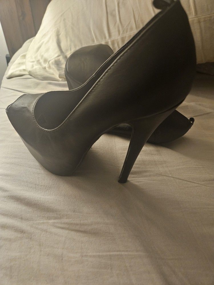 Heels...like New. Never Worn Outside The House