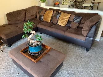 Couch and throw pillows and ottoman