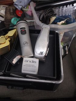 2 Andis Hair Clippers  With Extra Blades And Accessories 