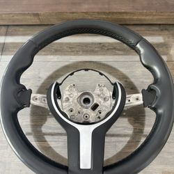Steering wheel + buttons