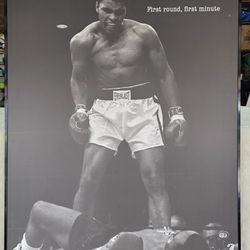 Muhammad Ali standing over Sonny Liston during their rematch on May 25, 1965. 