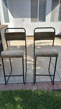 Two modern wooden stools