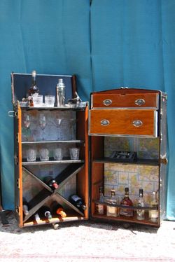 Vintage steamer wardrobe trunk converted into a cocktail, drinks, and wine bar