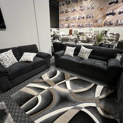Charcoal Sofa And Loveseat With Pillows $1,200