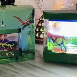 2009 NIB Illuminated dinosaur lights and motion carousel