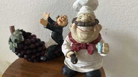 Wine bottle holder and chef figurine
