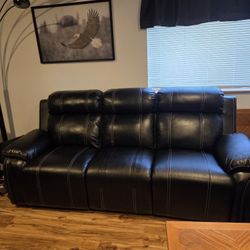 Sofe has 2 Recliners one on each side.