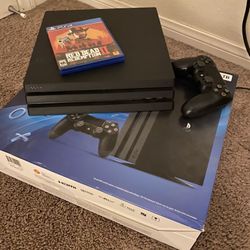 Ps4 (1 Tb) with Red Dead Redemption, And COD (MW)