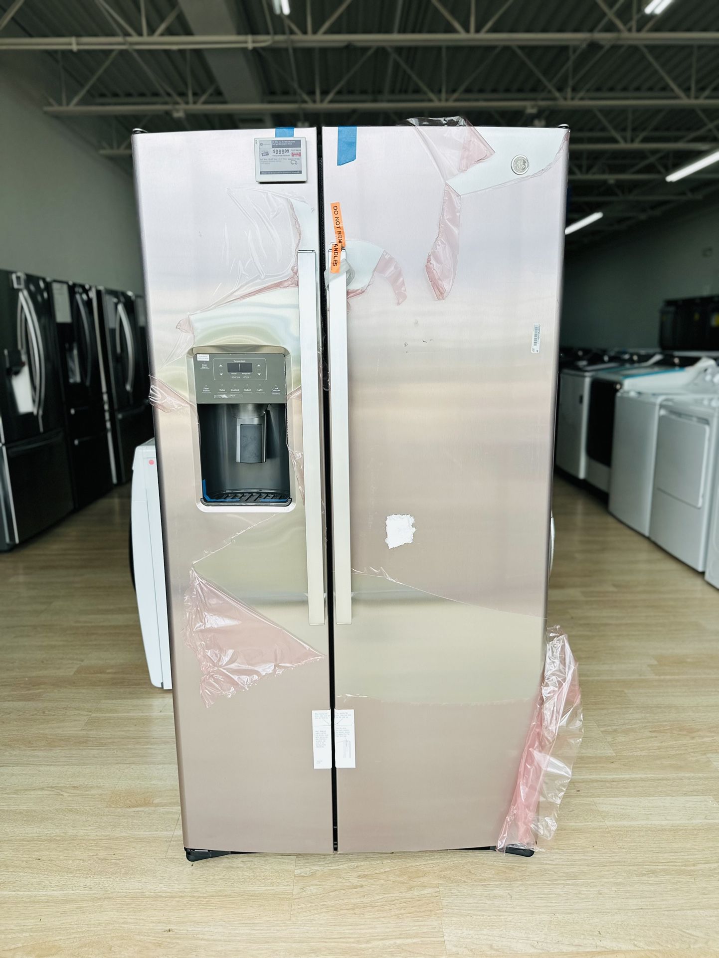 NEW GE - 25.3 Cu. Ft. Side-by-Side Refrigerator with External Ice & Water Dispenser - Stainless Steel Model:GSS25GYPFS