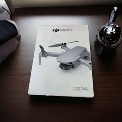 6538899 DJI mini 2 SE drone with remote control Floor Model 