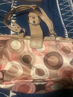 Coach Vintage Purse or Michael Kors. Each has a different Price