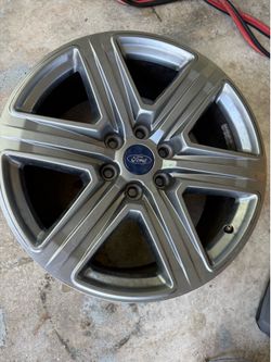 2021 ford f150 20 inch rim in excellent condition  new cost is 351.12