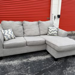 Ashley Furniture - Gray Reversible Sectional Couch! ***Free CurbSide Delivery***