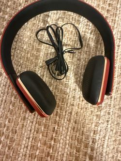 For Sale! Pretty red headphones with wire charger. New