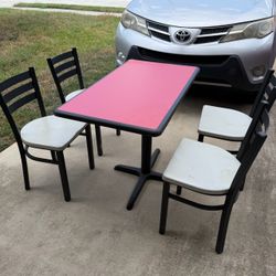Commercial grade table and four chairs