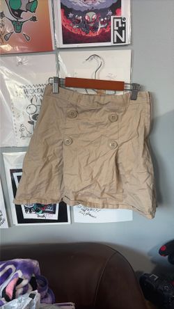 beige skort fits size small