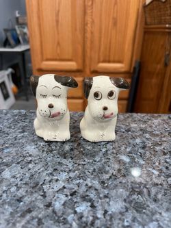 Vintage Pottery Rio Hondo Dog Pair of Salt and Pepper Shakers.  Size approximately 3 inches tall.  Preowned no stoppers.