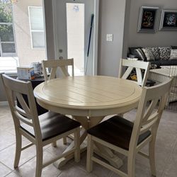 Dinette set. Table and four chairs.
