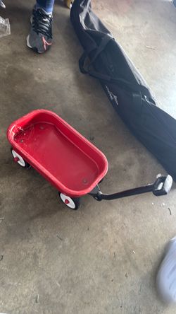 A red, little Radio Flyer wagon.
