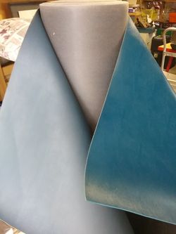 2 rolls of vinyl marine grade 54 in. wide unknown how many yards