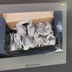 Seven black stem wine glasses