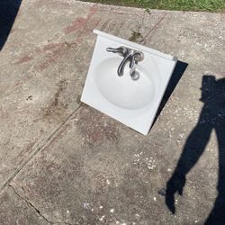 Bathroom sink and faucet