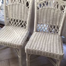 Four Wicker Chairs And Oval Table