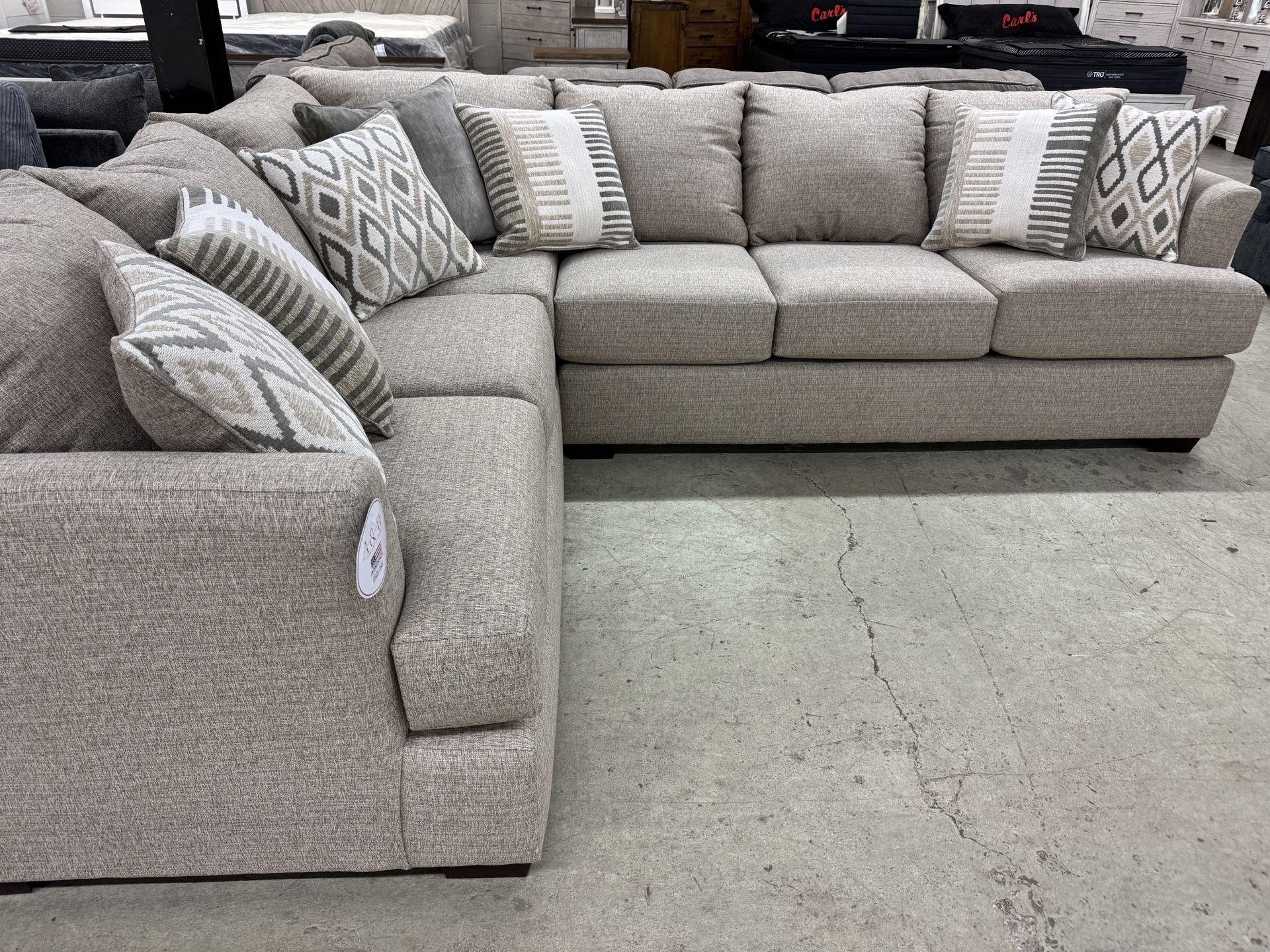 Beautiful two-piece sectional with pillows