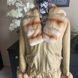 Women’s Warm jacket with natural fur.