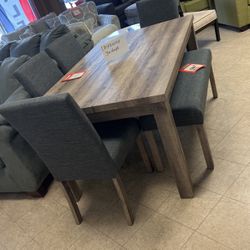 Dinette $600 table and four chairs brand new