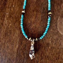 Turquoise Gold Banded Cinerea Shell Necklace