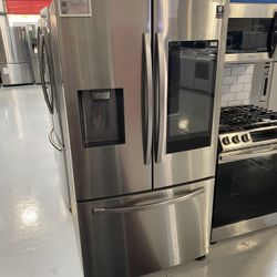 Samsung Stainless Steel 26.5 Cu. Ft. 3-Door French Door Refrigerator With Family Hub And External Water & Ice Dispenser