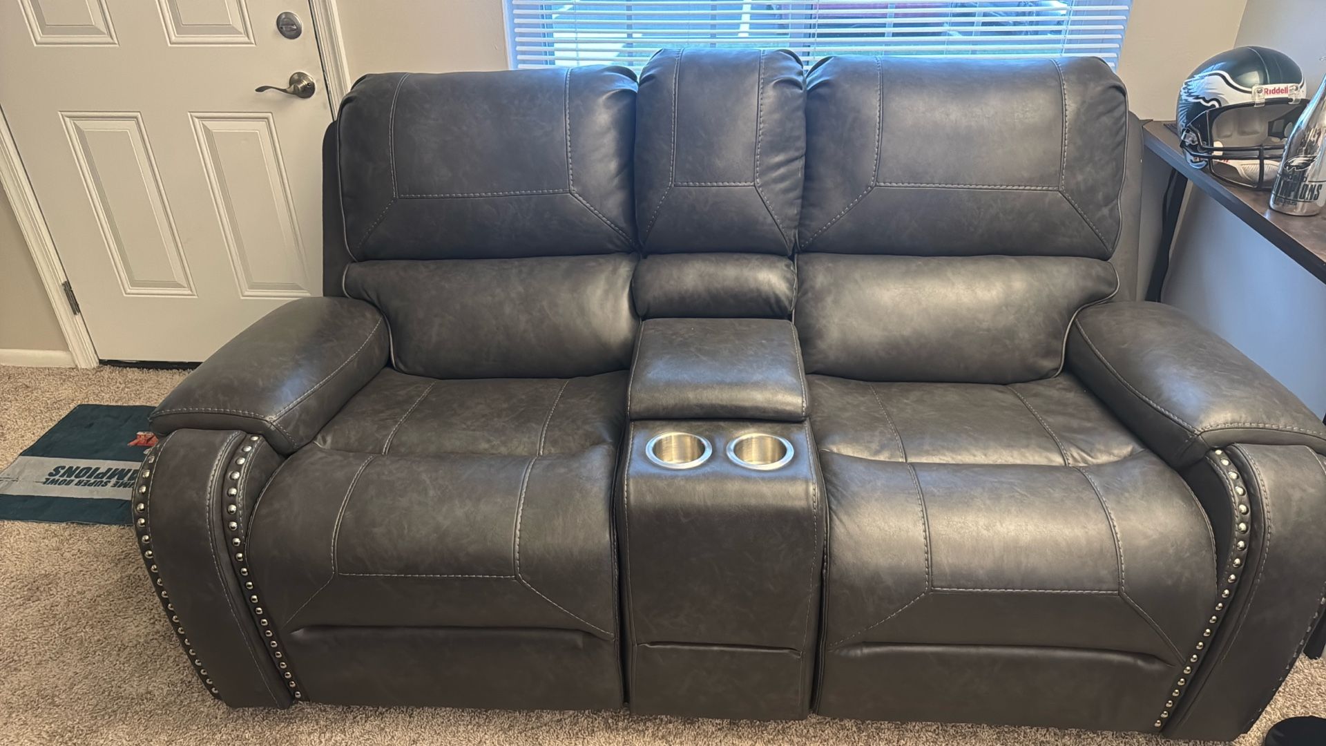 Brand New, Never Sat On. Raymour Flanigan Love Seat Leather, Gliding Recliner.