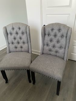 2 Light gray upholstered dining room chairs $110