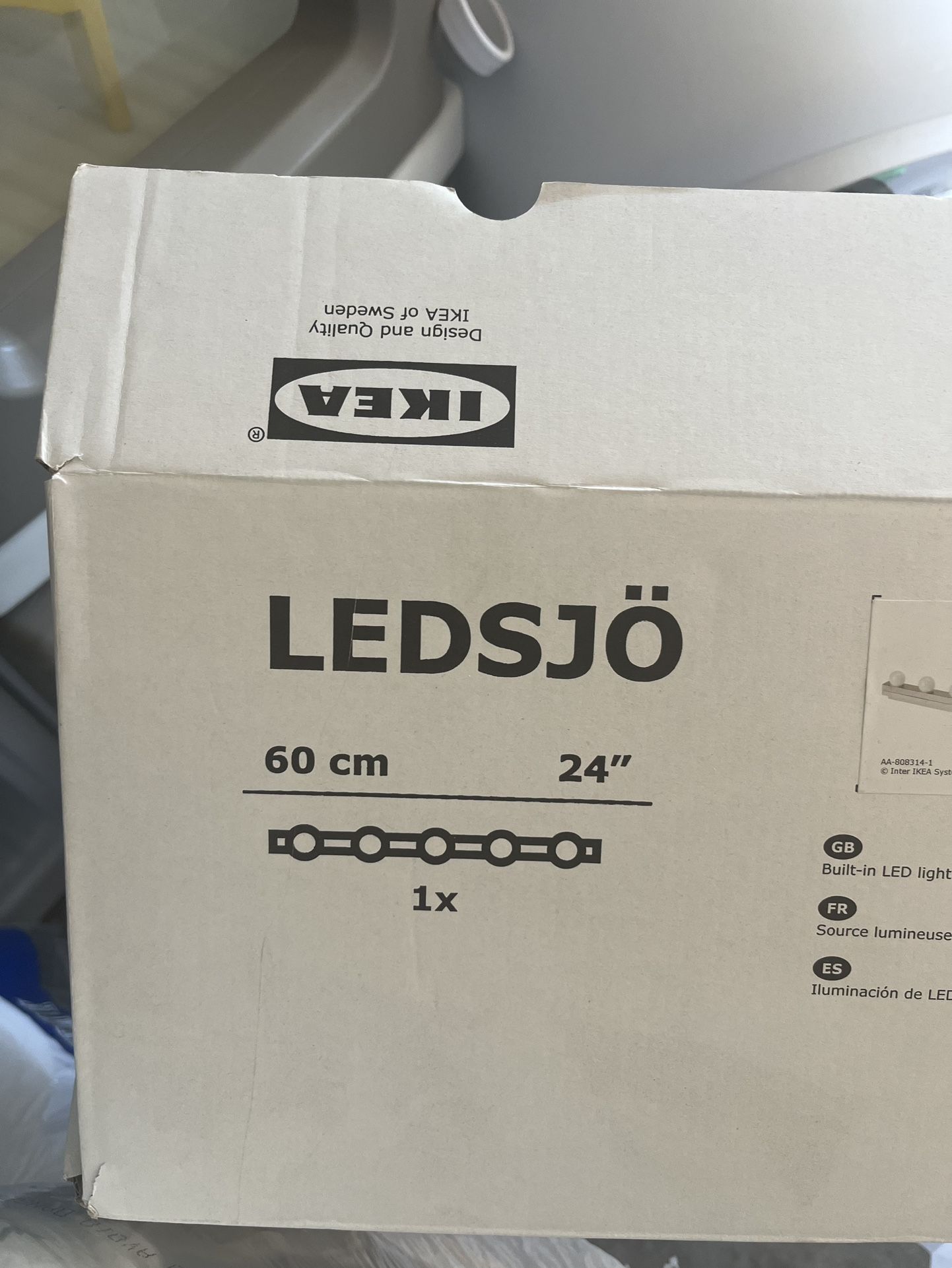 LEDSJÖ LED wall lamp, stainless steel, 24 "