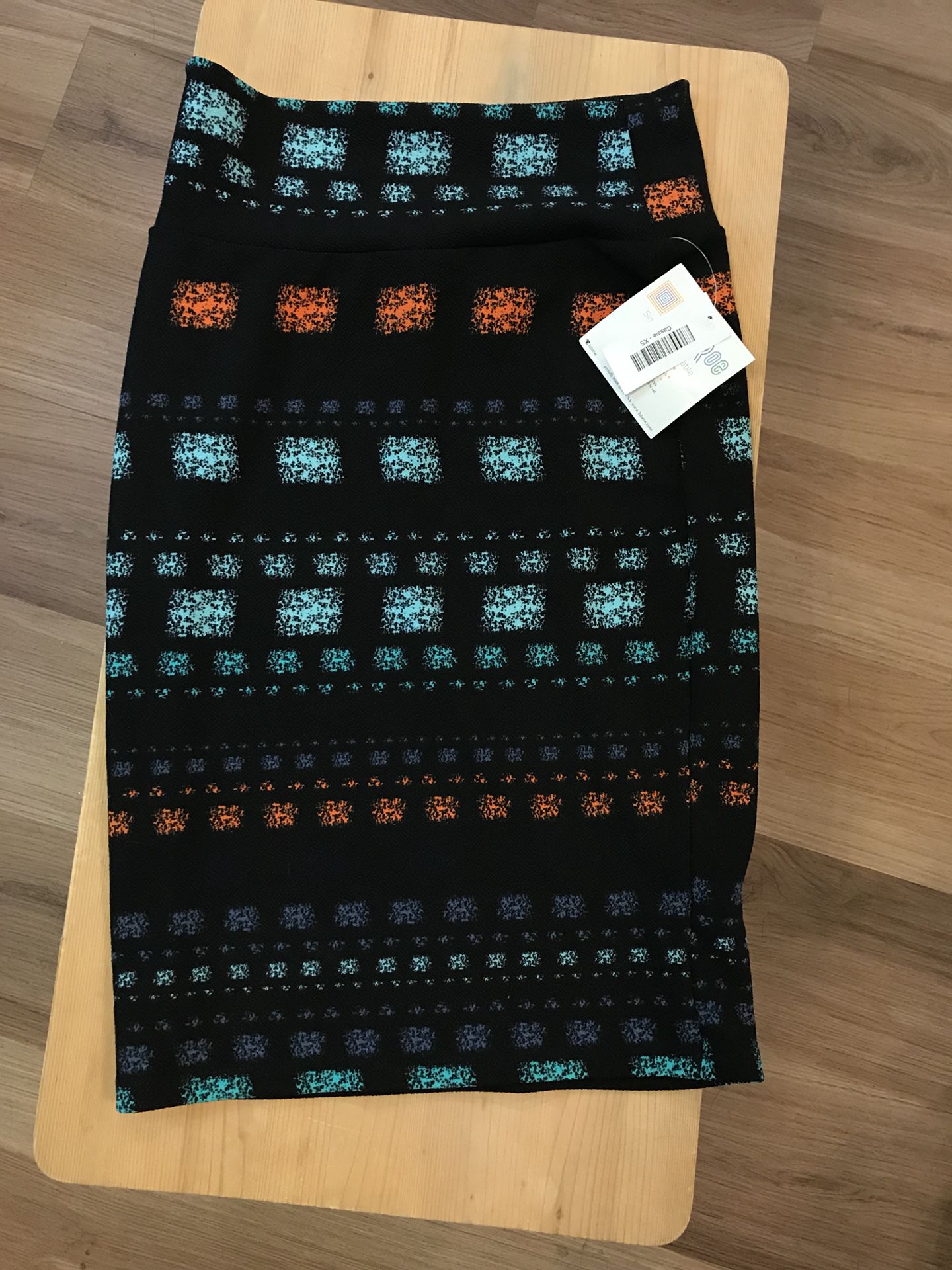 Lularoe Cassie xs. Black with colors. New W/tag