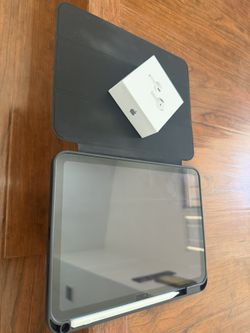 Apple iPad With AirPods And Pen