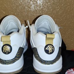 Jordan Spizike Low white metallic gold