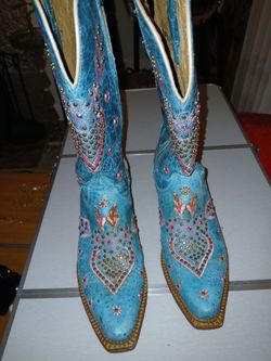 Ferrini cowboy boots and  Ranchers fedora