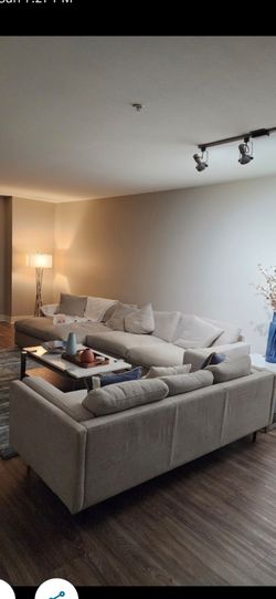 Beautiful living room set!! Sectional and separate couch with matching ottoman, coffee table and matching end tables!!!