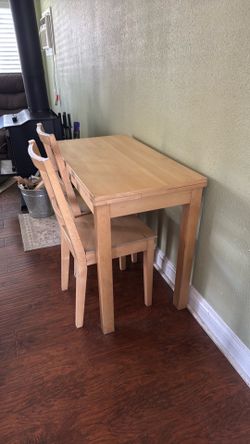 small to medium natural wood table