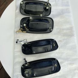 Four black 2005 Chevy Silverado door handles. Also fits other years